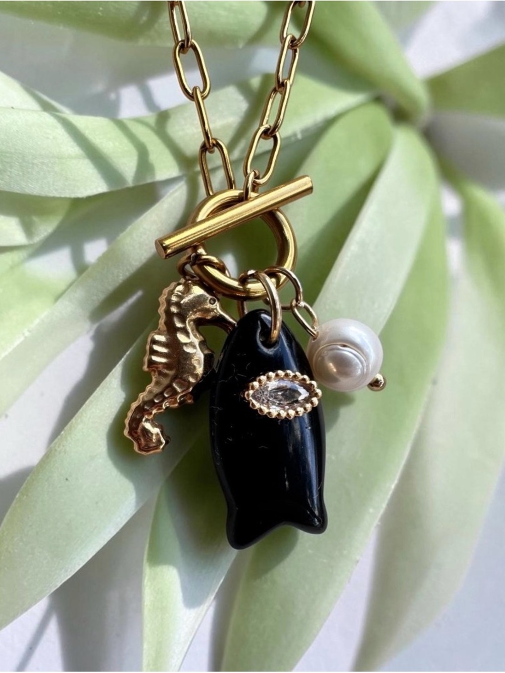 Black Fish Pendant, Pearl & Seahorse Charms on Paperclip Chain